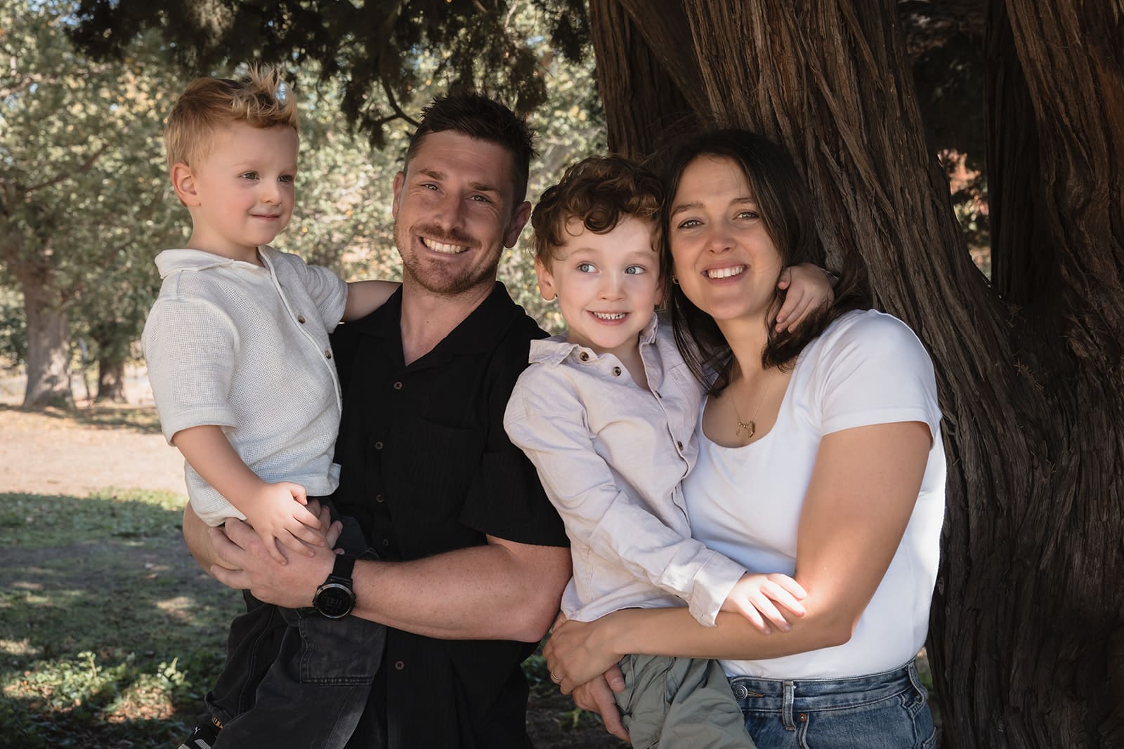 Family of four in shaded light in melbourne