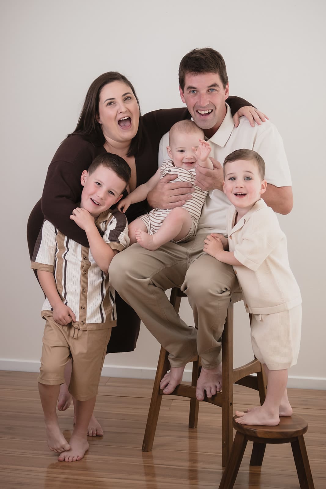 Melbourne studio family photography session with neutral coordinated outfits and three children